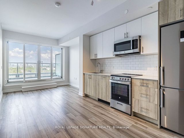 703 - 1195 The Queensway Ave