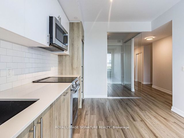 703 - 1195 The Queensway Ave