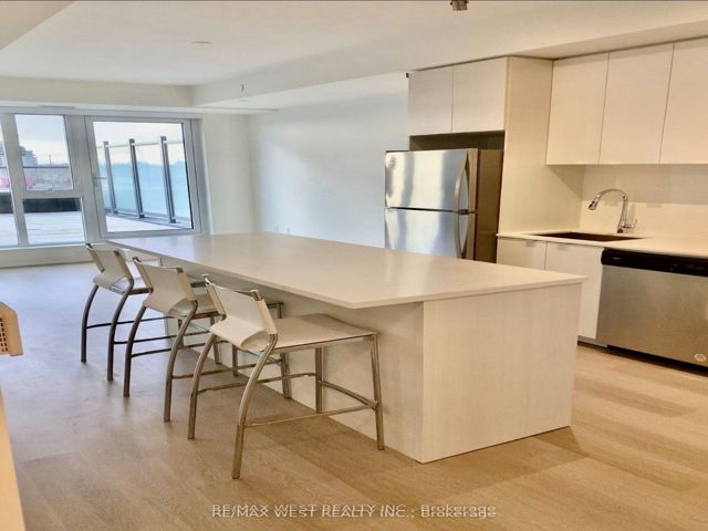305 - 859 The Queensway Blvd W