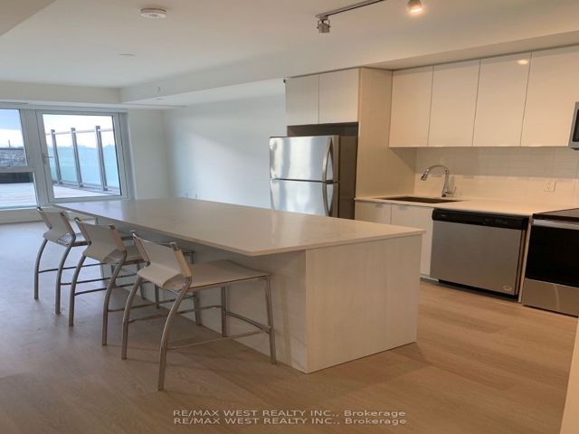 305 - 859 The Queensway Blvd W