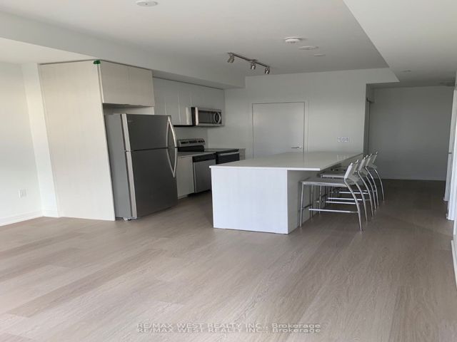 305 - 859 The Queensway Blvd W