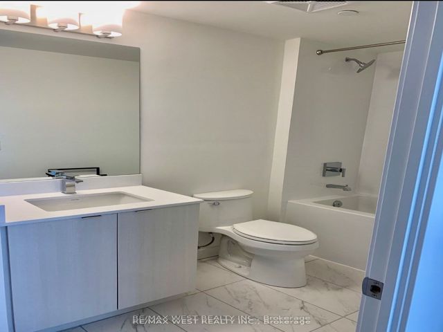 305 - 859 The Queensway Blvd W