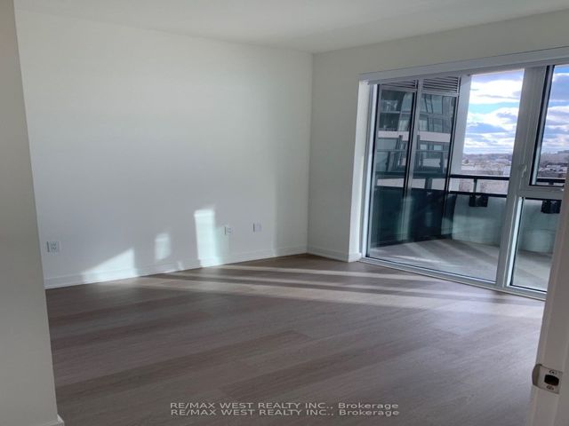 305 - 859 The Queensway Blvd W