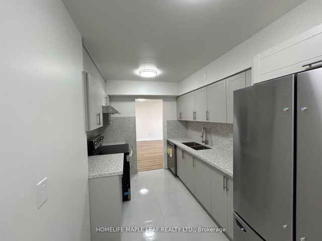 703 - 320 Dixon Rd