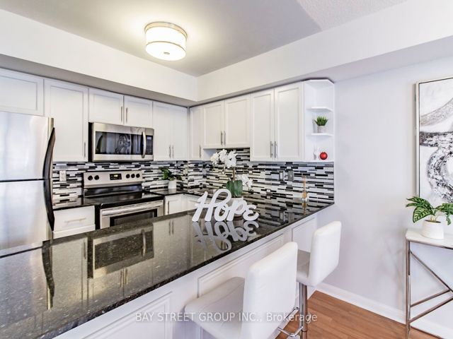 203 - 50 Joe Shuster Way