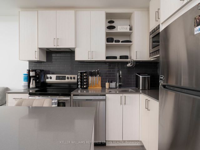 406 - 60 George Butchart Dr