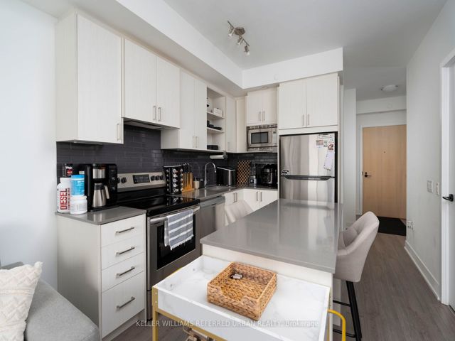 406 - 60 George Butchart Dr